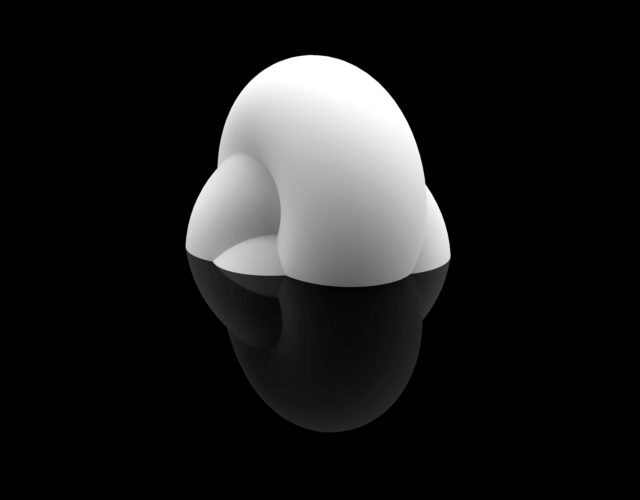 curved white object folded upon itself and reflection